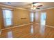 Large bedroom with hardwood floors, crown molding, and natural lighting at 116 Marshside Dr, Summerville, SC 29485