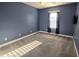 Bedroom features bright window, plush carpet and television at 116 Marshside Dr, Summerville, SC 29485