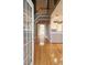 View of the interior with hardwood floors, staircase, and partial kitchen view at 116 Marshside Dr, Summerville, SC 29485
