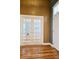 Bright office space featuring stylish french doors and gleaming hardwood floors at 116 Marshside Dr, Summerville, SC 29485