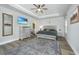 Spacious bedroom features a tray ceiling, wood-look floors, and modern furnishings at 119 Lucca Dr, Summerville, SC 29486