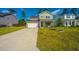 Charming two-story home with a well-manicured front yard and a driveway at 119 Lucca Dr, Summerville, SC 29486