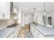 Modern kitchen featuring gray countertops, white cabinets, stainless steel appliances, and stylish backsplash at 119 Lucca Dr, Summerville, SC 29486