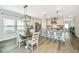 Stylish kitchen featuring stainless steel appliances, a large island, and an adjacent dining area at 119 Lucca Dr, Summerville, SC 29486