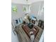Open concept living room with fireplace, TV, high ceilings, and access to the outdoor patio at 119 Lucca Dr, Summerville, SC 29486