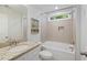Bathroom featuring a tiled shower-tub combo and granite countertop at 1216 Ashley Hall Rd, Charleston, SC 29407