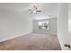Spacious bedroom with plush carpeting and a window overlooking the outdoor scenery at 1216 Ashley Hall Rd, Charleston, SC 29407