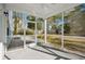 Spacious screened porch with view of lush backyard and patio area at 1216 Ashley Hall Rd, Charleston, SC 29407