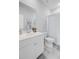 Bright bathroom with a white vanity, blue shower curtain, and coastal decor at 1226 Spotflower St, Summerville, SC 29485