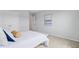 Bedroom with a light color scheme, showing a bed, painting, and view into the doorway at 1226 Spotflower St, Summerville, SC 29485