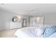 Stylish main bedroom with ample space, a ceiling fan, natural light, and a calming aesthetic at 1226 Spotflower St, Summerville, SC 29485