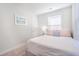 Cozy bedroom features neutral tones, large windows and carpet floors at 1242 Schirmer St, Mount Pleasant, SC 29464