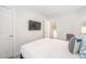 Brightly lit bedroom with carpeted floors, a side chair, and tv at 1242 Schirmer St, Mount Pleasant, SC 29464