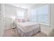 Bright bedroom features neutral tones, large windows and carpet floors at 1242 Schirmer St, Mount Pleasant, SC 29464