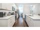 Modern kitchen with stainless steel appliances, white cabinetry and sleek countertops at 1242 Schirmer St, Mount Pleasant, SC 29464