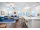 Bright living space showcasing the kitchen island, hardwood floors, and stylish decor at 1242 Schirmer St, Mount Pleasant, SC 29464