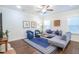 Well-lit living room boasting hardwood floors, a sectional sofa, and chic decor at 1242 Schirmer St, Mount Pleasant, SC 29464