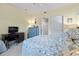 Bedroom with desk, blue dresser, and doorway access to other rooms at 1300 Park West Blvd # 106, Mount Pleasant, SC 29466