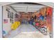 Garage interior featuring a variety of recreational gear, tools, and patriotic decor at 1300 Park West Blvd # 106, Mount Pleasant, SC 29466