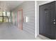 Hallway with doors to apartments at 1300 Park West Blvd # 106, Mount Pleasant, SC 29466