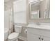 Well-lit bathroom with a combination tub and shower and white vanity and neutral decor at 132 Clear Bend Ln, Summerville, SC 29486