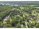 Aerial view showcasing the property in a verdant residential community near the river at 1337 Old Fort Rd, Moncks Corner, SC 29461