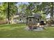 Backyard features a firepit and gazebo, offering space for outdoor entertaining and relaxation at 1337 Old Fort Rd, Moncks Corner, SC 29461
