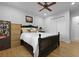 Bedroom featuring a ceiling fan, hardwood floors, a closet, and a window for natural light at 1337 Old Fort Rd, Moncks Corner, SC 29461