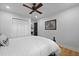 Bedroom featuring a ceiling fan, hardwood floors, a window, and a closet for storage at 1337 Old Fort Rd, Moncks Corner, SC 29461