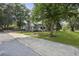 A lovely home with a front porch, green lawn, mature trees, and a long driveway leading to the property at 1337 Old Fort Rd, Moncks Corner, SC 29461