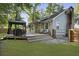 Charming home with a backyard featuring a deck, gazebo, and well-maintained lawn at 1337 Old Fort Rd, Moncks Corner, SC 29461