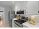 Updated kitchen features stainless steel appliances, modern oven, and stylish white countertops at 1337 Old Fort Rd, Moncks Corner, SC 29461
