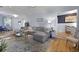Spacious living area featuring a comfortable sectional, hardwood floors, and stylish decor at 1337 Old Fort Rd, Moncks Corner, SC 29461