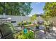 Backyard patio area with comfortable outdoor seating and grill, perfect for entertaining at 1350 Water Edge Dr, Charleston, SC 29492