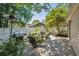 Backyard patio area with comfortable outdoor seating and a grill, perfect for entertaining at 1350 Water Edge Dr, Charleston, SC 29492