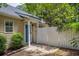 Entrance view of a quaint home with a tidy walkway and a well-kept front yard at 1350 Water Edge Dr, Charleston, SC 29492