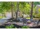 Charming front yard featuring a comfortable seating area around a fire pit at 1350 Water Edge Dr, Charleston, SC 29492