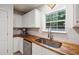 This light and airy kitchen features butcher block countertops, stainless steel appliances and white subway tile at 1350 Water Edge Dr, Charleston, SC 29492