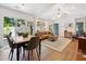 Open living area featuring dining area and outdoor patio, ideal for entertaining at 1350 Water Edge Dr, Charleston, SC 29492