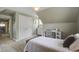 Bright bedroom featuring plush carpet, white trim, a desk, and ample natural light at 136 Heart Pine Cir, Summerville, SC 29485