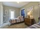 Comfortable bedroom with a twin bed, dresser, nautical decor and carpet flooring at 136 Heart Pine Cir, Summerville, SC 29485