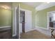 Hallway closet with a washer, wire rack shelving, and storage solutions at 136 Heart Pine Cir, Summerville, SC 29485