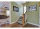 Welcoming entryway with staircase, hardwood floors, and neutral wall color at 136 Heart Pine Cir, Summerville, SC 29485