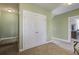 Upstairs hallway with carpet, a double door closet and connecting rooms at 136 Heart Pine Cir, Summerville, SC 29485
