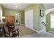 Upstairs hallway features green walls, carpet and a wooden armoire at 136 Heart Pine Cir, Summerville, SC 29485