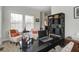 Home office featuring a large desk, a laptop, and a decorative rug at 136 Heart Pine Cir, Summerville, SC 29485
