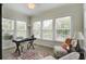 Bright home office with many windows, neutral walls and carpeted floor at 136 Heart Pine Cir, Summerville, SC 29485