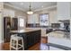 Well-equipped kitchen with stainless steel appliances, sleek countertops, and an island, perfect for cooking and entertaining at 136 Heart Pine Cir, Summerville, SC 29485