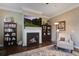 Inviting living room with a fireplace, elegant decor, and a comfortable armchair at 136 Heart Pine Cir, Summerville, SC 29485
