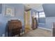 Room featuring a hardwood desk, a cushioned bench beneath a window, and neutral carpet at 136 Heart Pine Cir, Summerville, SC 29485